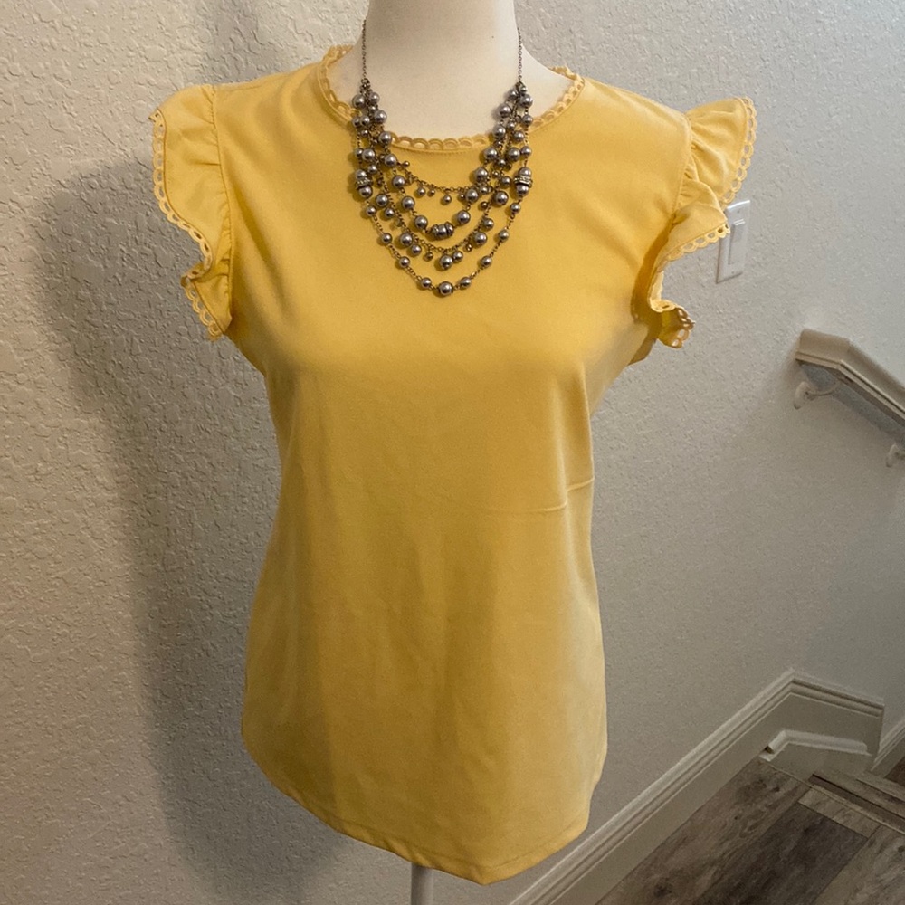 Pale yellow ruffle sleeve blouse